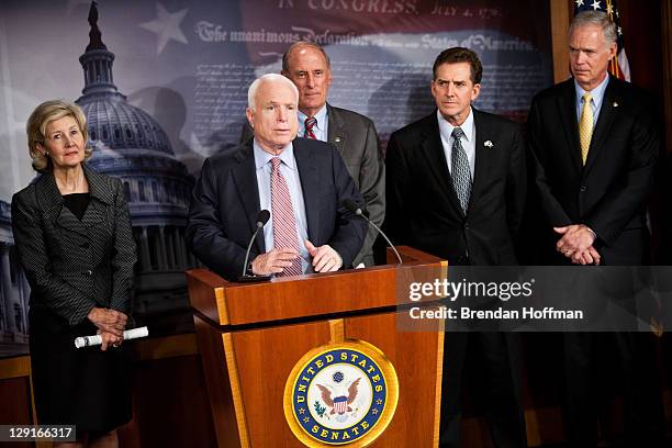 Sen. John McCain speaks as U.S. Sen. Kay Bailey Hutchison , U.S. Sen. Dan Coats , U.S. Sen. Jim DeMint , and U.S. Sen. Ron Johnson look on during a...