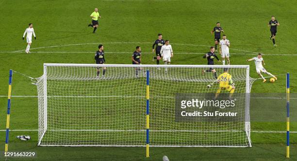 Ezgjan Alioski of Leeds United scores their team's fourth goal past Karl Darlow during the Premier League match between Leeds United and Newcastle...