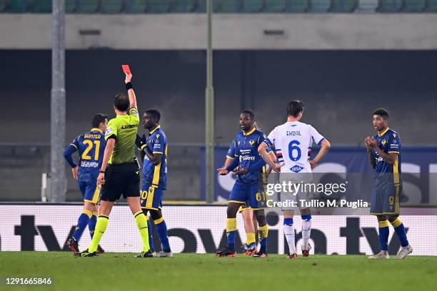 The referee Riccardo Ros gets a red card to Antonin Barak of Hellas Verona after a VAR decision during the Serie A match between Hellas Verona FC and...