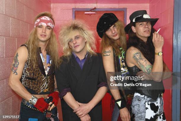 American heavy metal group Poison, circa 1990. Left to right: singer Bret Michaels, guitarist CC DeVille, drummer Rikki Rockett and bassist Bobby...