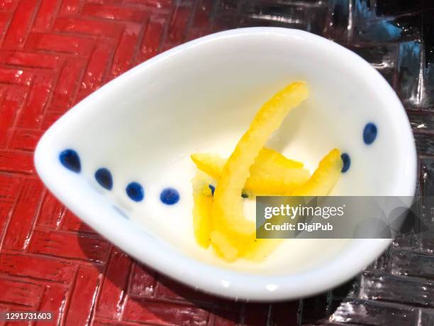 condiment for japanese nabe hotpot - yuzu stock pictures, royalty-free photos & images