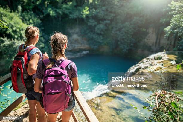 mother and daughter hiking in colle di val d'elsa, tuscany, italy - girl hiking stock pictures, royalty-free photos & images