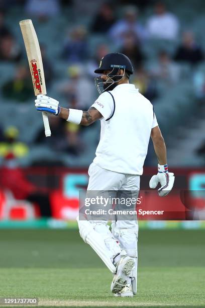 Virat Kohli of India celebrates reaching 50 runs during day one of the First Test match between Australia and India at Adelaide Oval on December 17,...