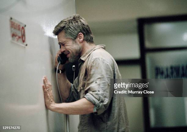 American actor Brad Pitt in a hospital scene during the filming of 'Babel', 2005. The film was directed by Alejandro Gonzalez Inarritu. In this scene...
