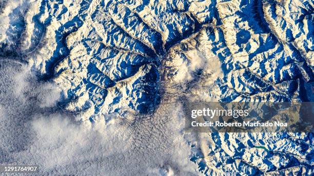 beauty of planet earth's crust, the iss flies over saint-etienne, france - veicolo spaziale foto e immagini stock