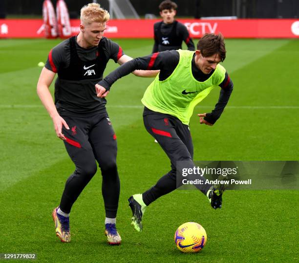 Leighton Clarkson and Luis Longstaff of Liverpool during a training session at AXA Training Centre on December 17, 2020 in Kirkby, England.