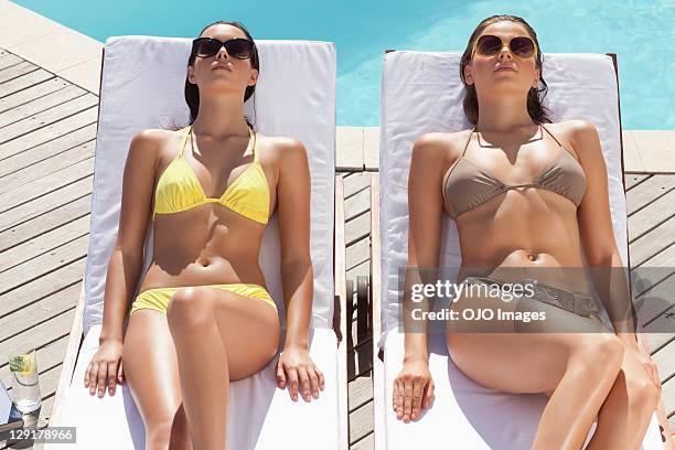 Swimwear And Young Girls And Resting Photos and Premium High Res Pictures -  Getty Images