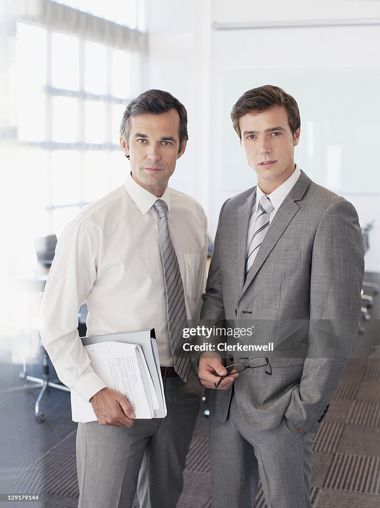 Portrait of smiling business men in office