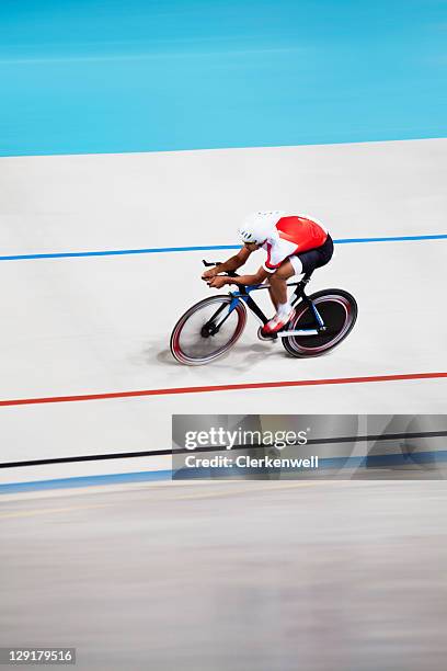 high angle view of rider riding bicycle - track cycling stock pictures, royalty-free photos & images