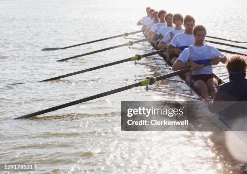 Athletes in a crew canoe Athletes in a crew canoe