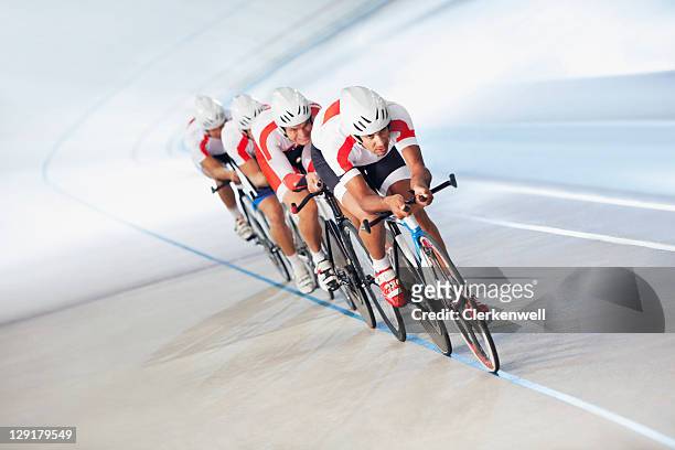 competitors on cycling track - sports race stock pictures, royalty-free photos & images