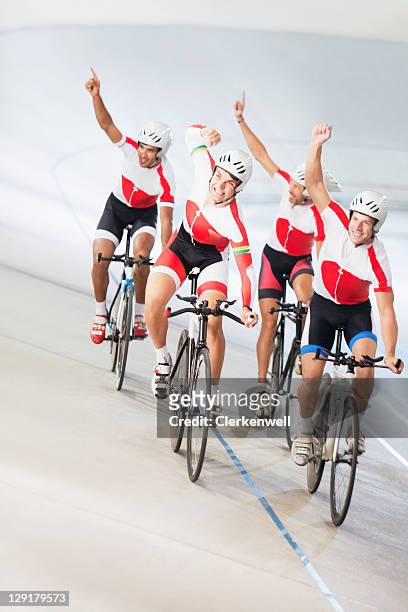 group of cyclists cheering - cykelbana bildbanksfoton och bilder