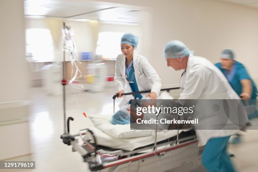 Patient Rushed Patient Being Rushed To Operating Room High-Res Stock Photo - Getty Images