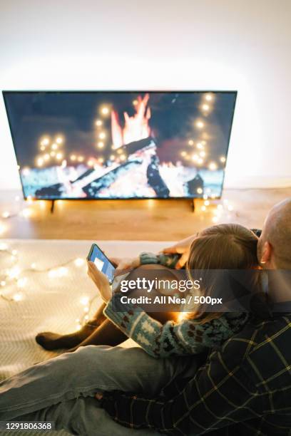 cozy caucasian couple celebrate the holidays in quarantine,lleida,spain - night in fotografías e imágenes de stock