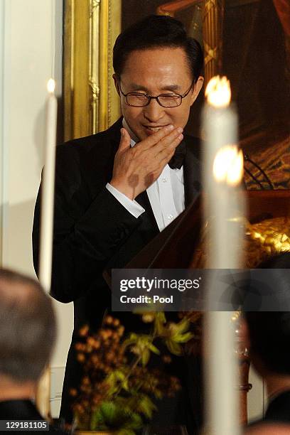 South Korean President Lee Myung-bak toasts U.S. President Barack Obama during a State Dinner in the East Room of the White House October 13, 2011 in...