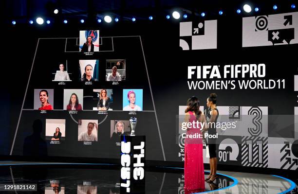 Laura Georges and Reshmin Chowdhury present the FIFA FIFAPRO Women's World 11 team during the The Best FIFA Football Awards on December 17, 2020 in...