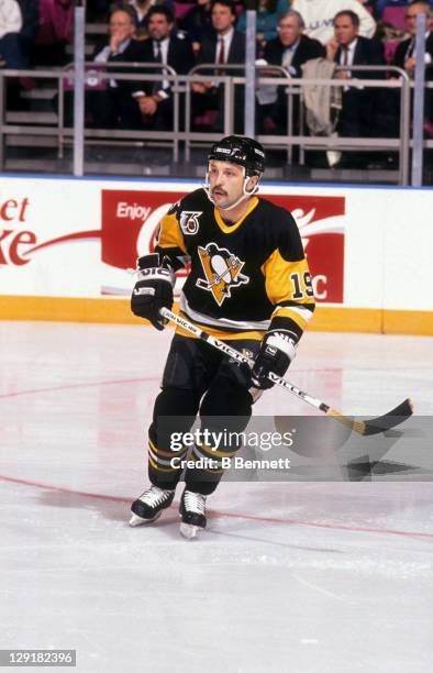 Bryan Trottier of the Pittsburgh Penguins skates on the ice during an NHL game against the New York Rangers on November 11, 1991 at the Madison...