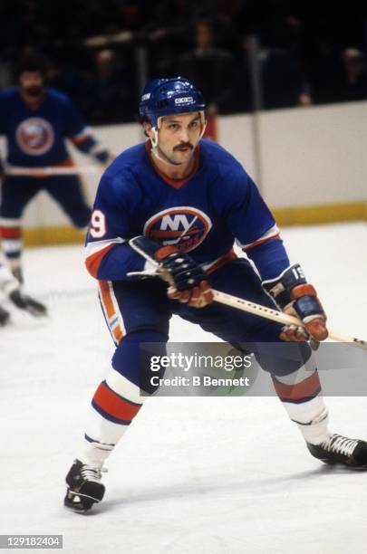 Bryan Trottier of the New York Islanders skates on the ice during an NHL game against the New York Rangers circa 1983 at the Madison Square Garden in...