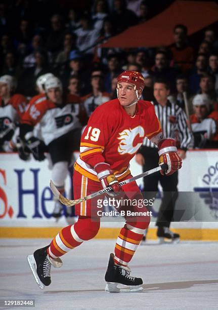 Tim Hunter of the Calgary Flames skates on the ice during an NHL game against the Philadelphia Flyers on January 22, 1991 at the Spectrum in...