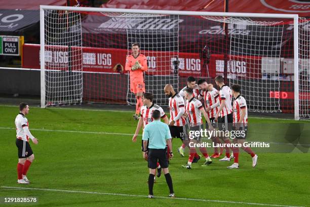 David McGoldrick of Sheffield United celebrates with team mates Jack Robinson, John Egan, Oliver Burke, Chris Basham and Ethan Ampadu after scoring...