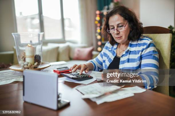 retired woman managing on a low income - unemployment stock pictures, royalty-free photos & images