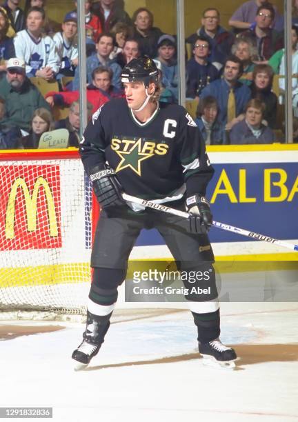 Derian Hatcher of the Dallas Stars skates against the Toronto Maple Leafs during NHL game action on January 25, 1997 at Maple Leaf Gardens in...