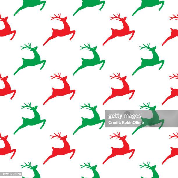 jumping reindeer seamless pattern - textile patch stock illustrations