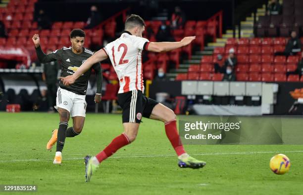 Marcus Rashford of Manchester United scores their sides third goal during the Premier League match between Sheffield United and Manchester United at...