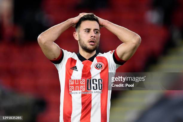 George Baldock of Sheffield United reacts during the Premier League match between Sheffield United and Manchester United at Bramall Lane on December...