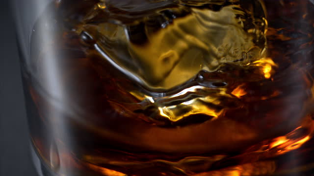 Pouring Whiskey On The Rocks Super Slow Motion