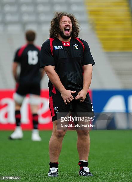 Prop Adam Jones Shares a joke during a Wales IRB Rugby World Cup 2011 captain's run at Eden Park on October 14, 2011 in Auckland, New Zealand.