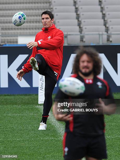 Wales' fly half James Hook and prop Adam Jones attend the Captain's run at the Eden Park in Auckland on October 14 on the eve of their 2011 Rugby...