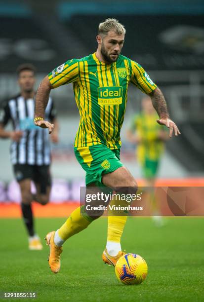 Charlie Austin of West Bromwich Albion in action during the Premier League match between Newcastle United and West Bromwich Albion at St. James Park...