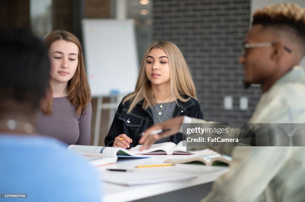 Teamwork For Group Assignment High-Res Stock Photo - Getty Images