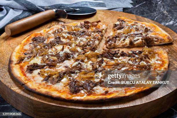 thin crust pizza - pizza crust stock pictures, royalty-free photos & images