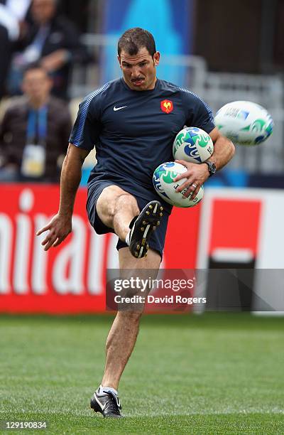 France head coach Marc Lievremont kicks a ball during a France IRB Rugby World Cup 2011 captain's run at Eden Park on October 14, 2011 in Auckland,...