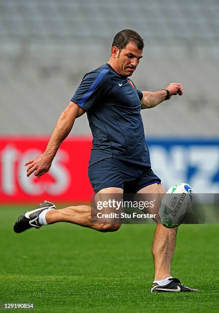 France head coach Marc Lievremont kicks a ball during a France IRB Rugby World Cup 2011 captain's run at Eden Park on October 14, 2011 in Auckland,...