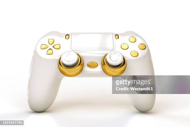white and gold colored video game console - control stock pictures, royalty-free photos & images