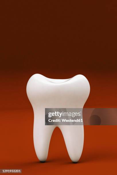 human molar on red background - menschlicher zahn stock-grafiken, -clipart, -cartoons und -symbole