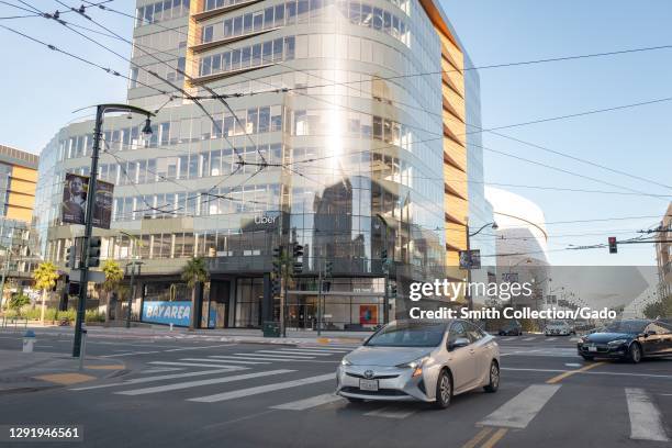 Logo is visible on facade at headquarters of ridesharing company Uber in Mission Bay, San Francisco, California, November 19, 2020.