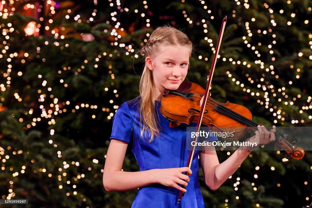 King Philippe Of Belgium, Queen Mathilde, Prince Emmanuel And Princess Eleonore Attend The Christmas Concert By The Scala Choir At the Royal Palace In Brussels