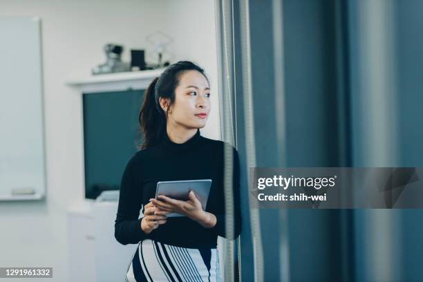 asian businesswomen in company - taiwan business stock pictures, royalty-free photos & images