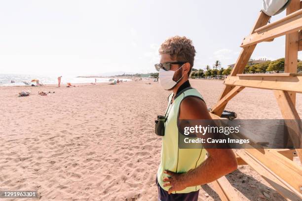 lifeguard in the new normaliy - heat illness stock pictures, royalty-free photos & images
