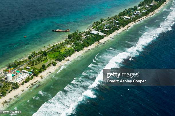 funafuti atoll on tuvalu form the air threatened by global warming induced sea level rise. - tuvalu stock pictures, royalty-free photos & images