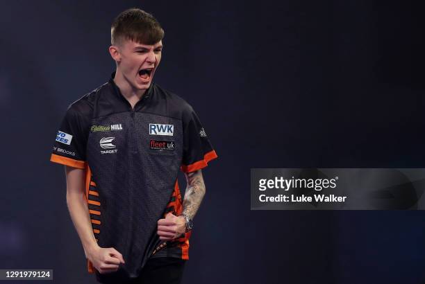 Bradley Brooks of England in action during his round one match against Dirk van Duijvenbode of Holland during day four of the PDC William Hill World...