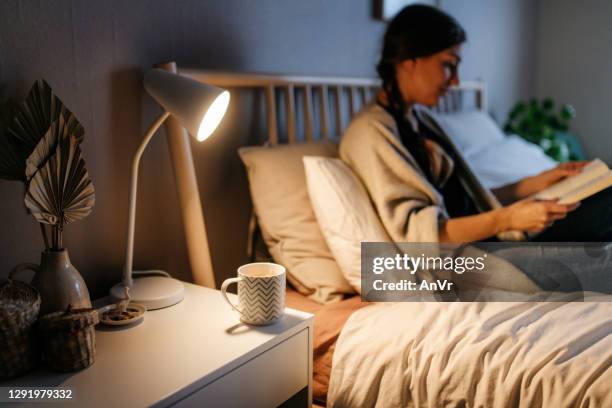 hot beverage on a night stand - bedside table stock pictures, royalty-free photos & images