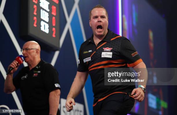 Dirk van Duijvenbode of Holland reacts during his round one match against Bradley Brooks of England during day four of the PDC William Hill World...
