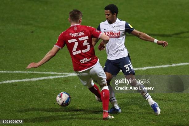 Taylor Moore of Bristol City concedes a penalty by fouling Scott Sinclair of Preston North End during the Sky Bet Championship match between Preston...