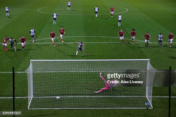 Daniel Johnson of Preston North End sends goalkeeper Daniel Bentley of Bristol City the wrong way to score from the penalty spot during the Sky Bet...