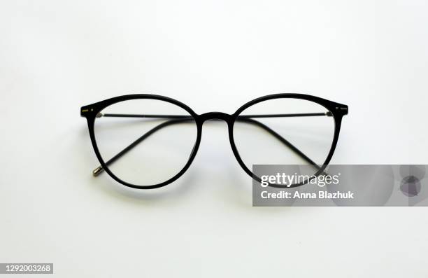 trendy modern eyeglasses over white background. concept of style, fashion, office, study and work. - lunettes de vue photos et images de collection